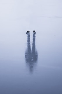 A close-up of a skater’s feet performing a perfect spin on the ice.