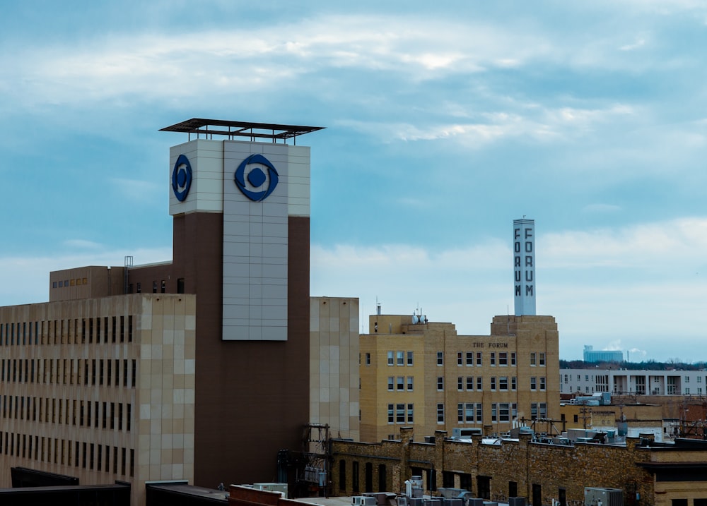 brown concrete building under blue sky during daytime