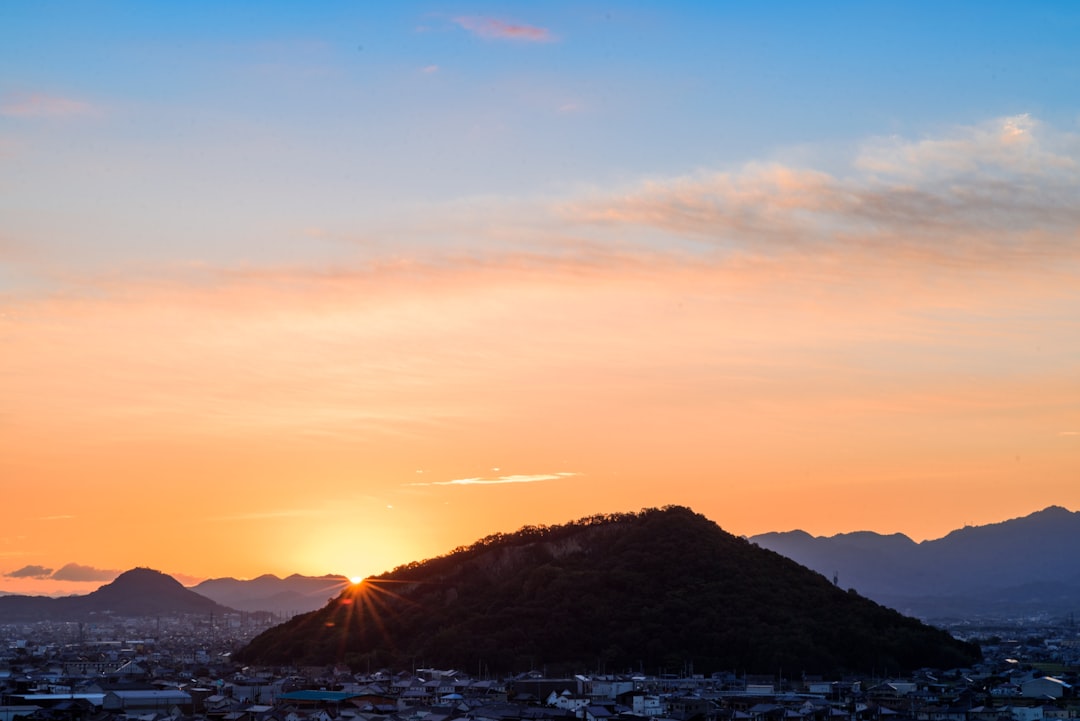 silhouette of mountain during sunset