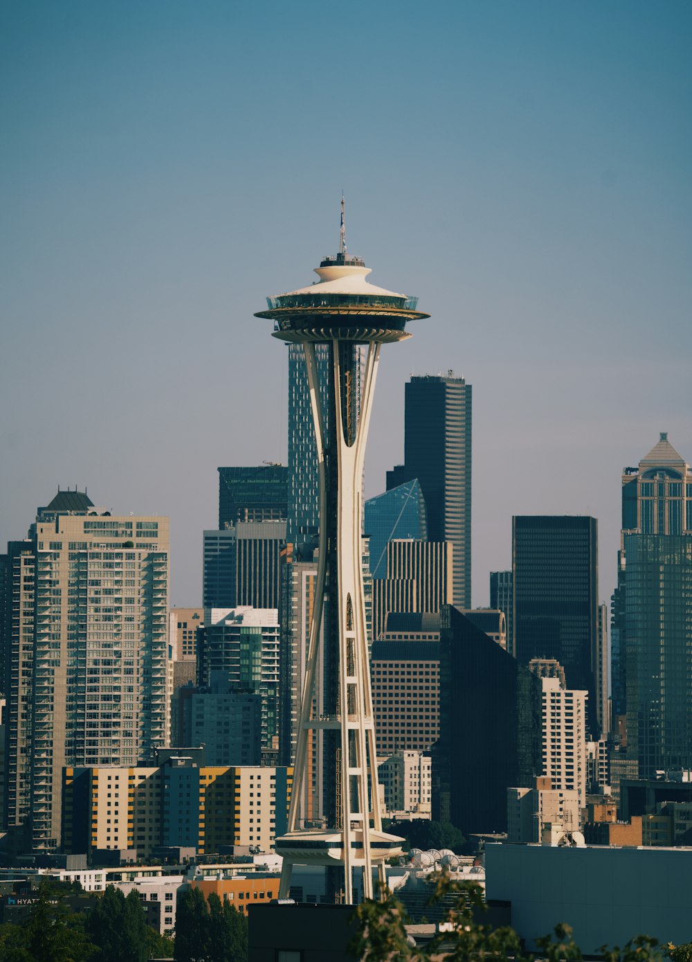 city skyline under gray sky during daytime