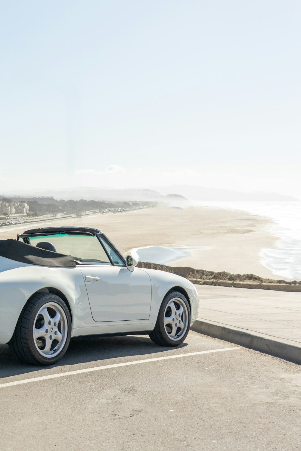 silver porsche 911 on road during daytime