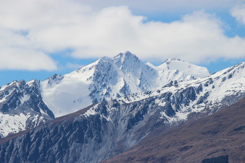 snow covered mountain under blue sky during daytime