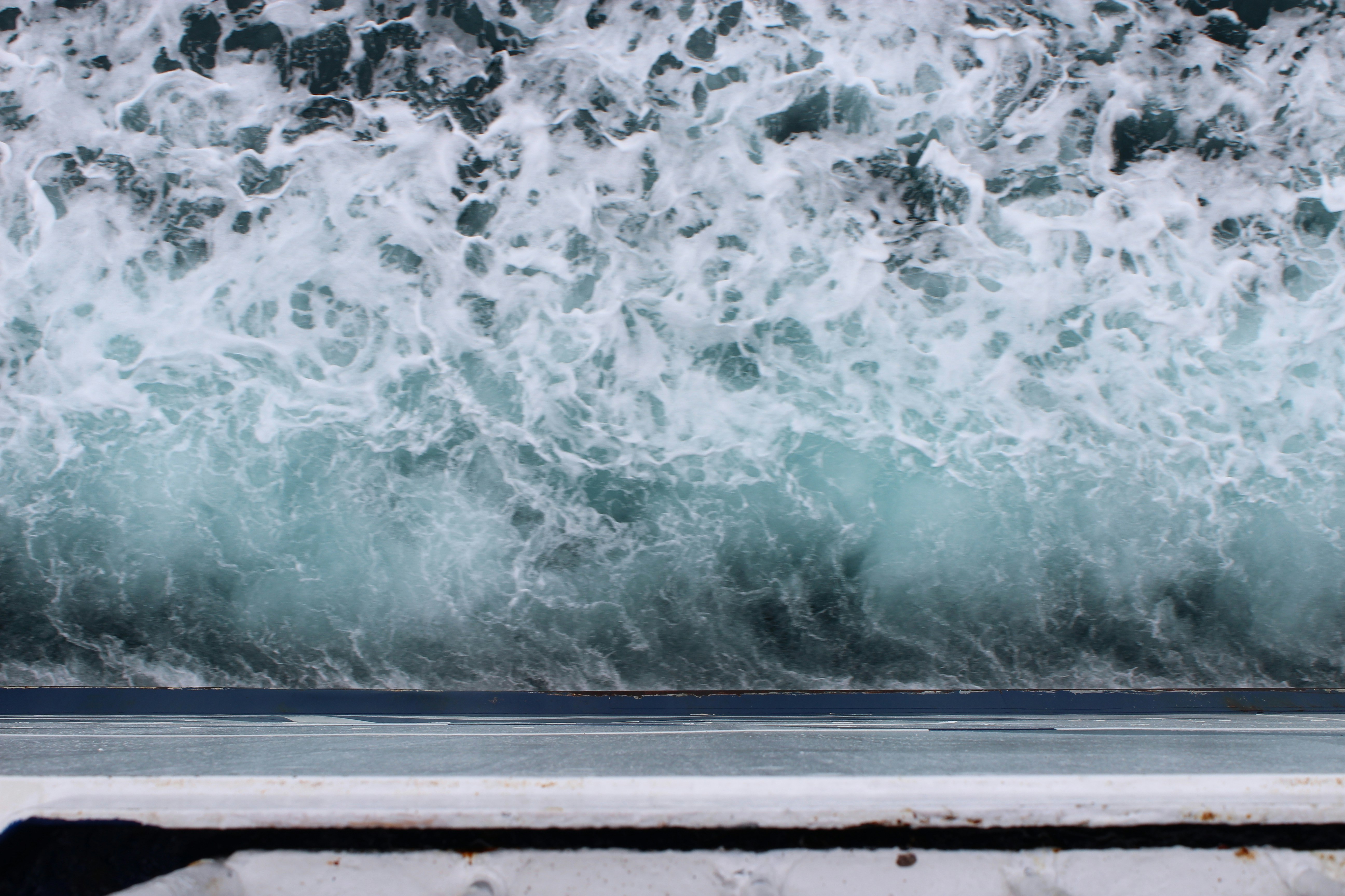 water waves on brown wooden frame