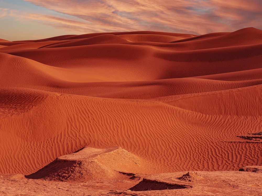 brown sand under blue sky during daytime