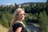 woman in black shirt wearing brown aviator sunglasses