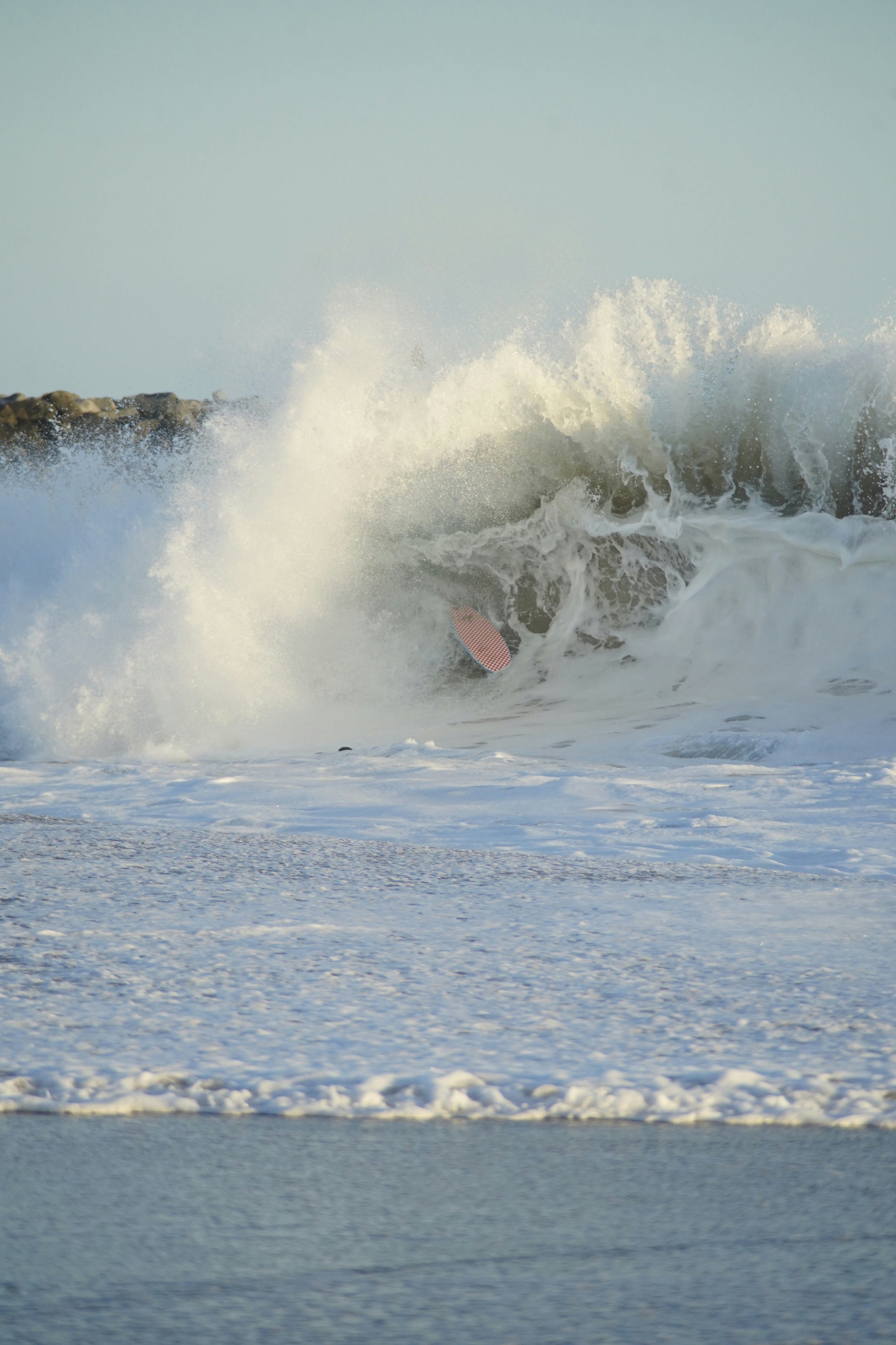ocean waves crashing on shore during daytime