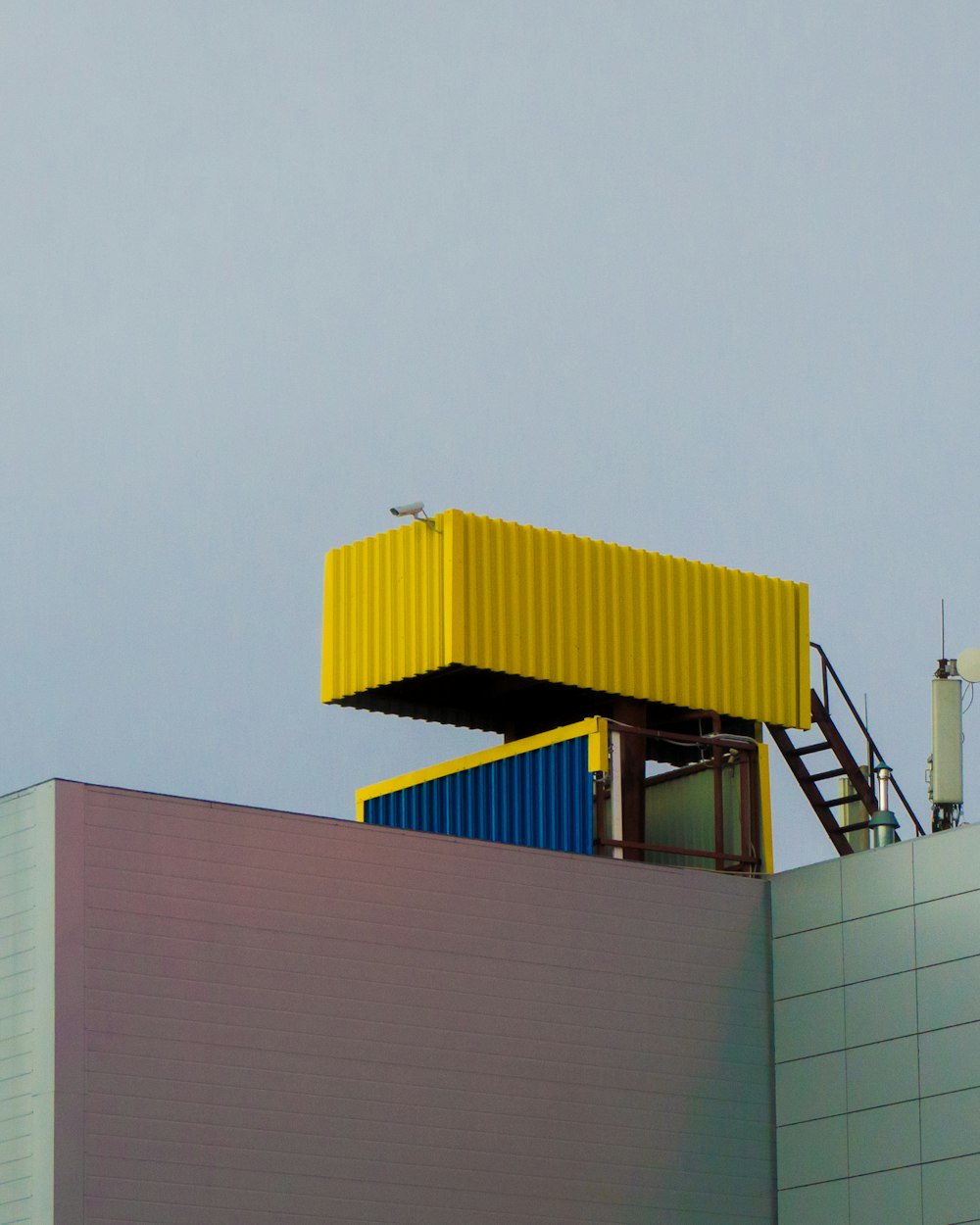 blue and orange metal building