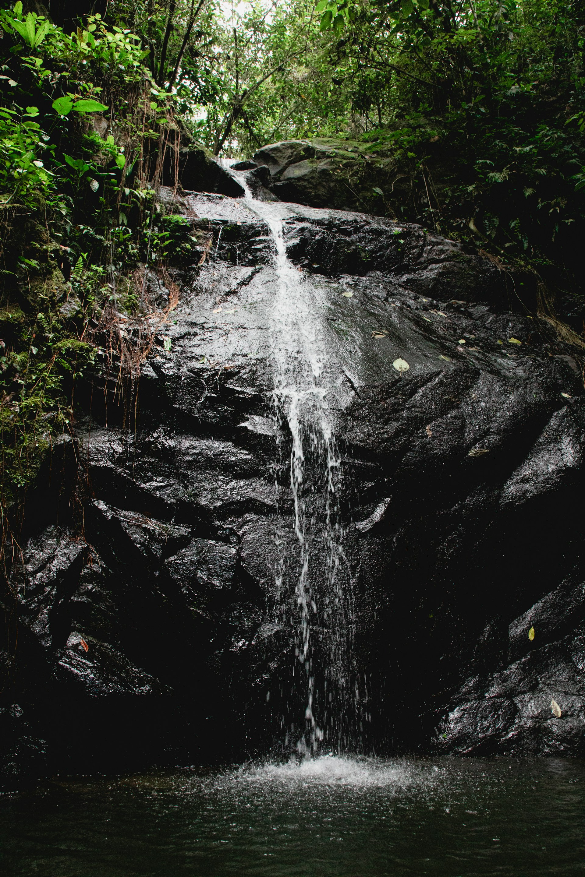 water falls on rocky mountain