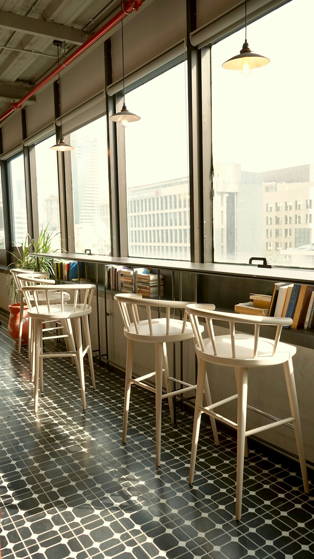 white and brown wooden table and chairs