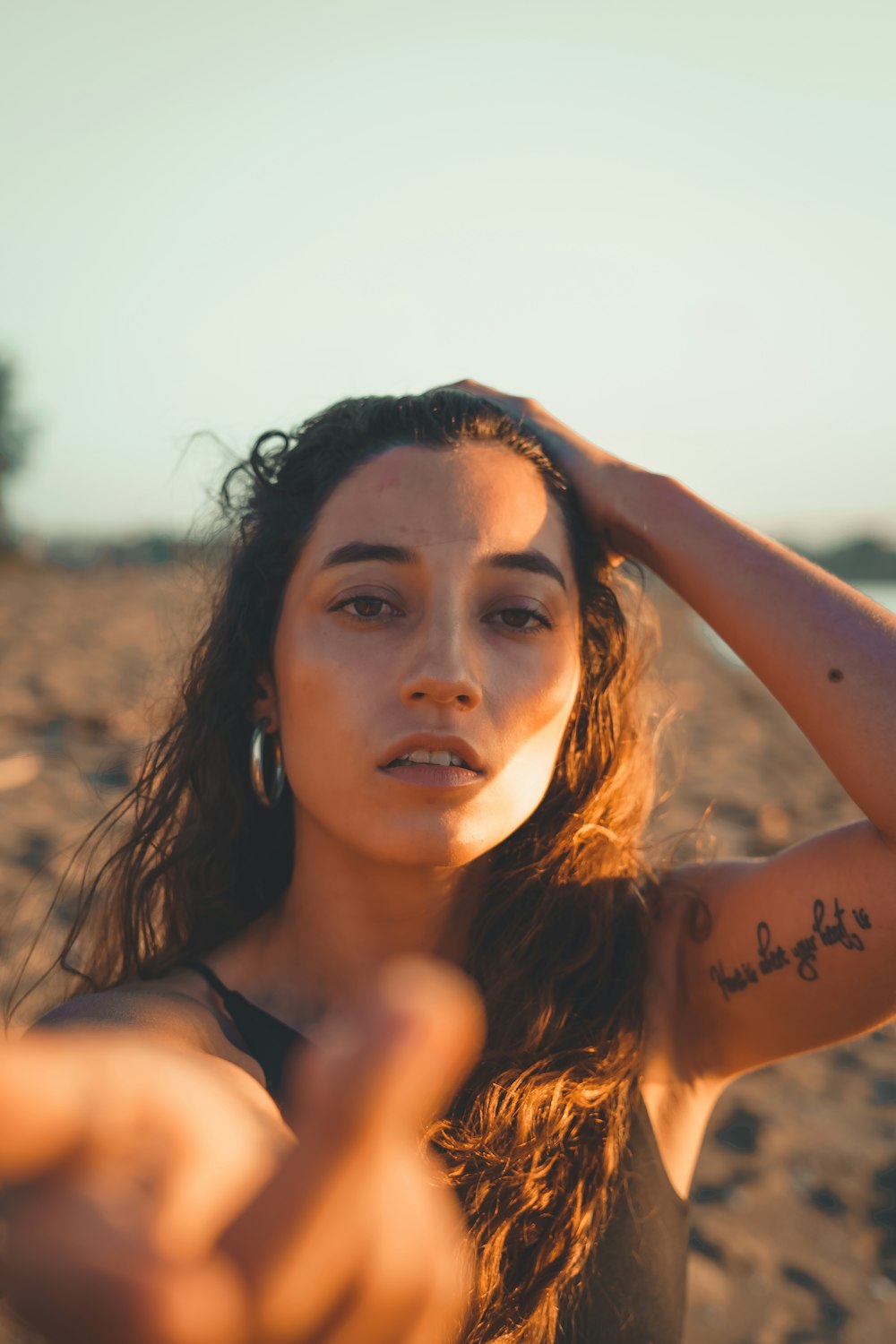 woman in black tank top