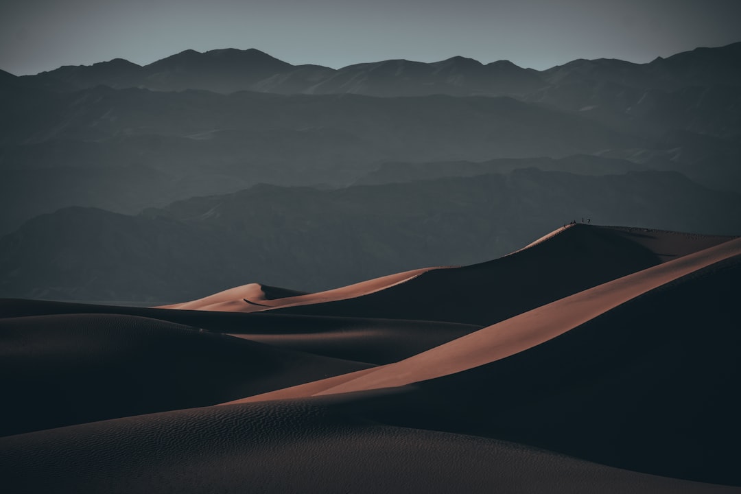 brown and black mountain under white sky during daytime