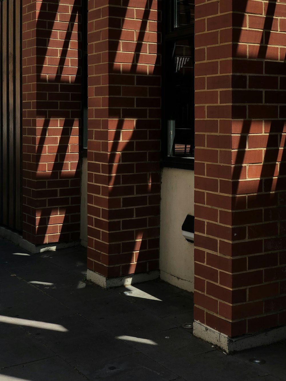 brown brick wall during daytime