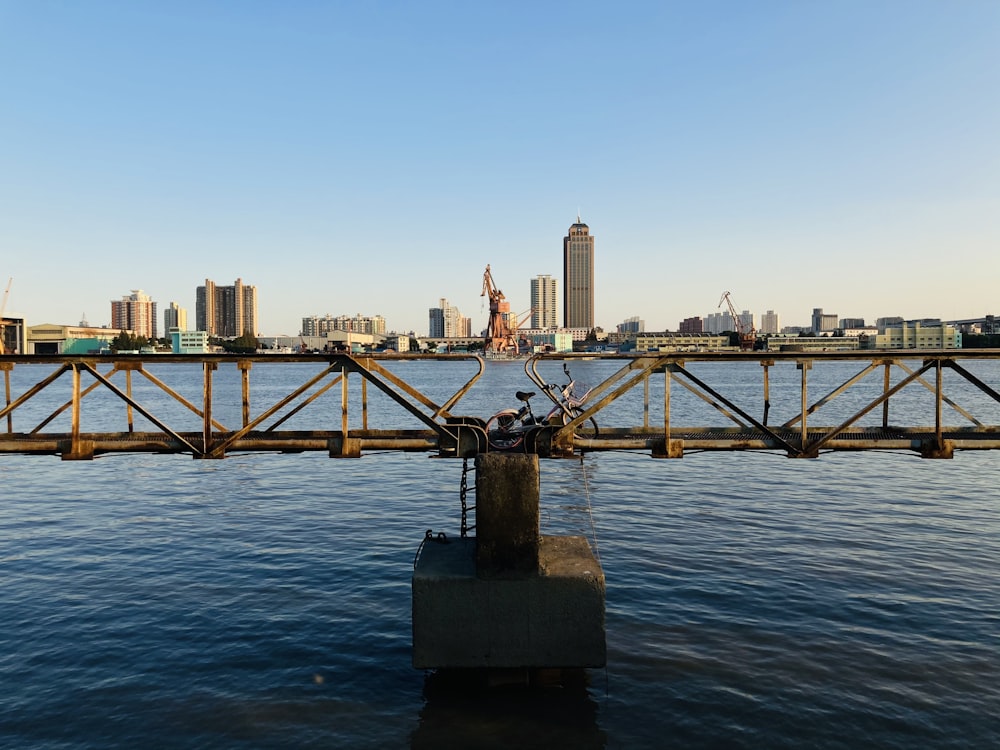 city skyline across body of water during daytime