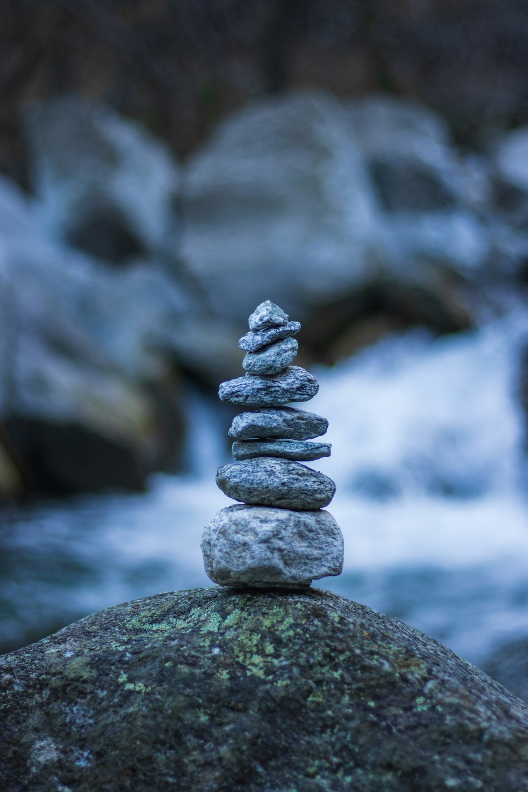 gray stone stack on water