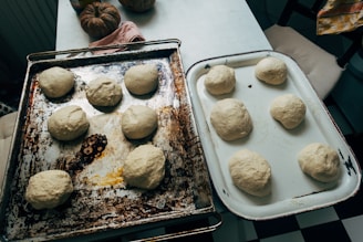 white and brown cookies on stainless steel tray