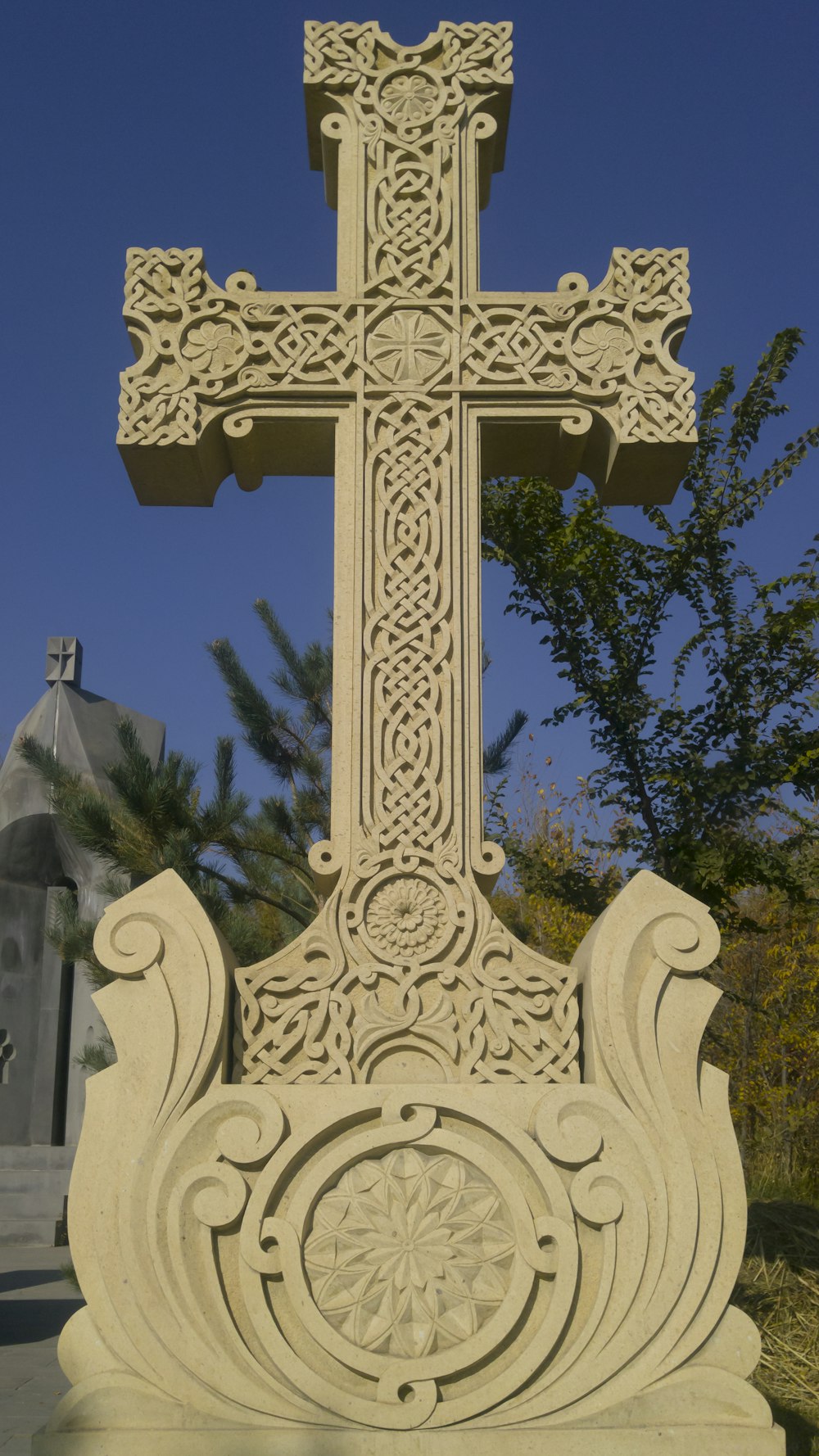 white concrete cross statue during daytime