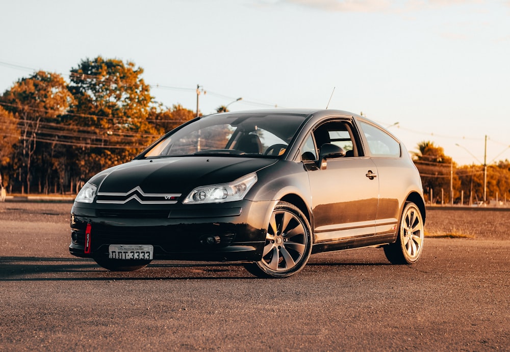 black honda sedan on road during daytime