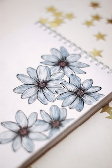 blue and white flower illustration