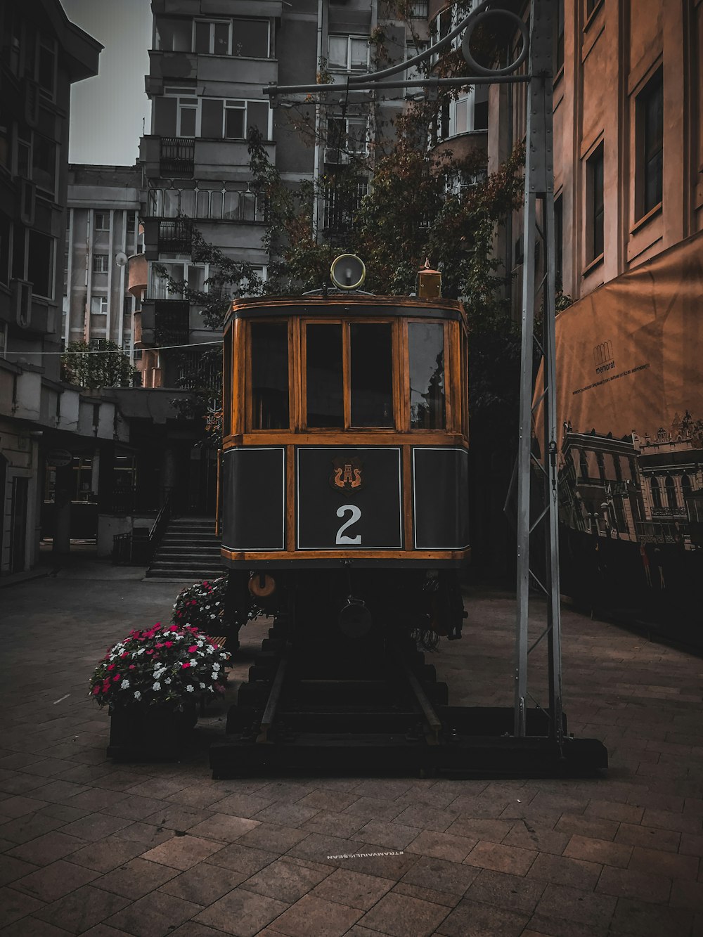 yellow and red train on rail road during daytime