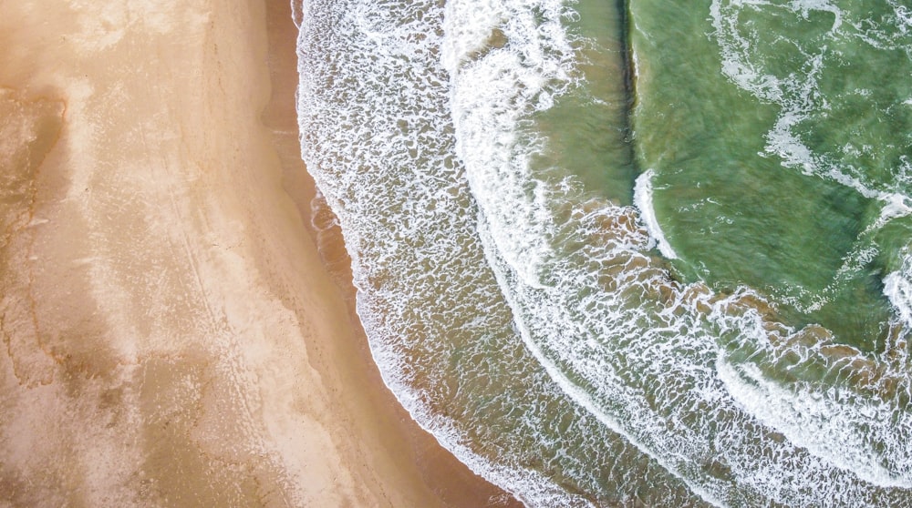 green and white water waves