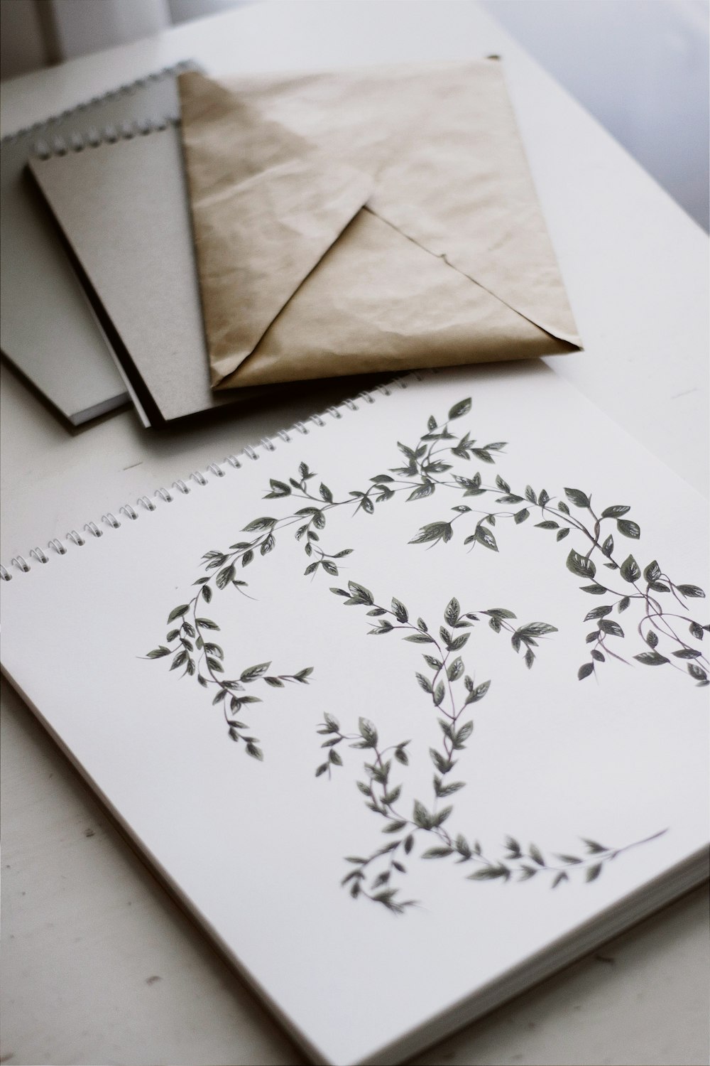 white printer paper on brown wooden table