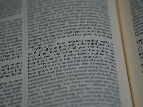 An open book with tightly spaced text filling the pages. The focus is on a section discussing religious or spiritual content, possibly from a sacred or historical text.