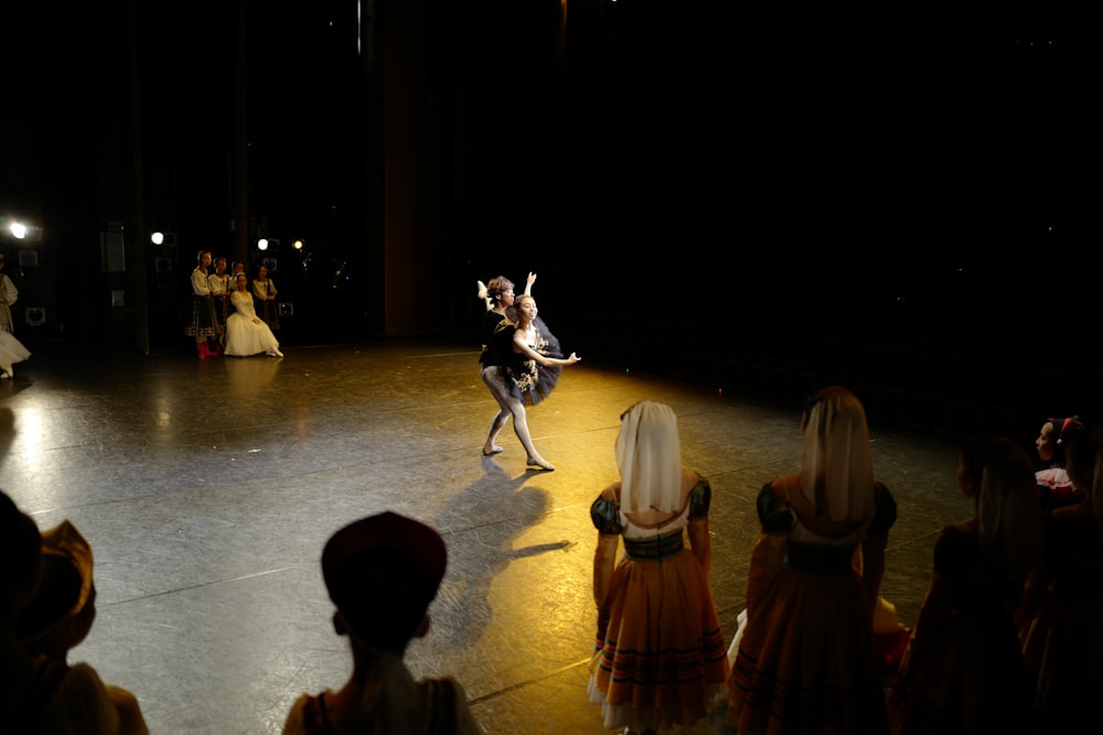 people dancing on white floor