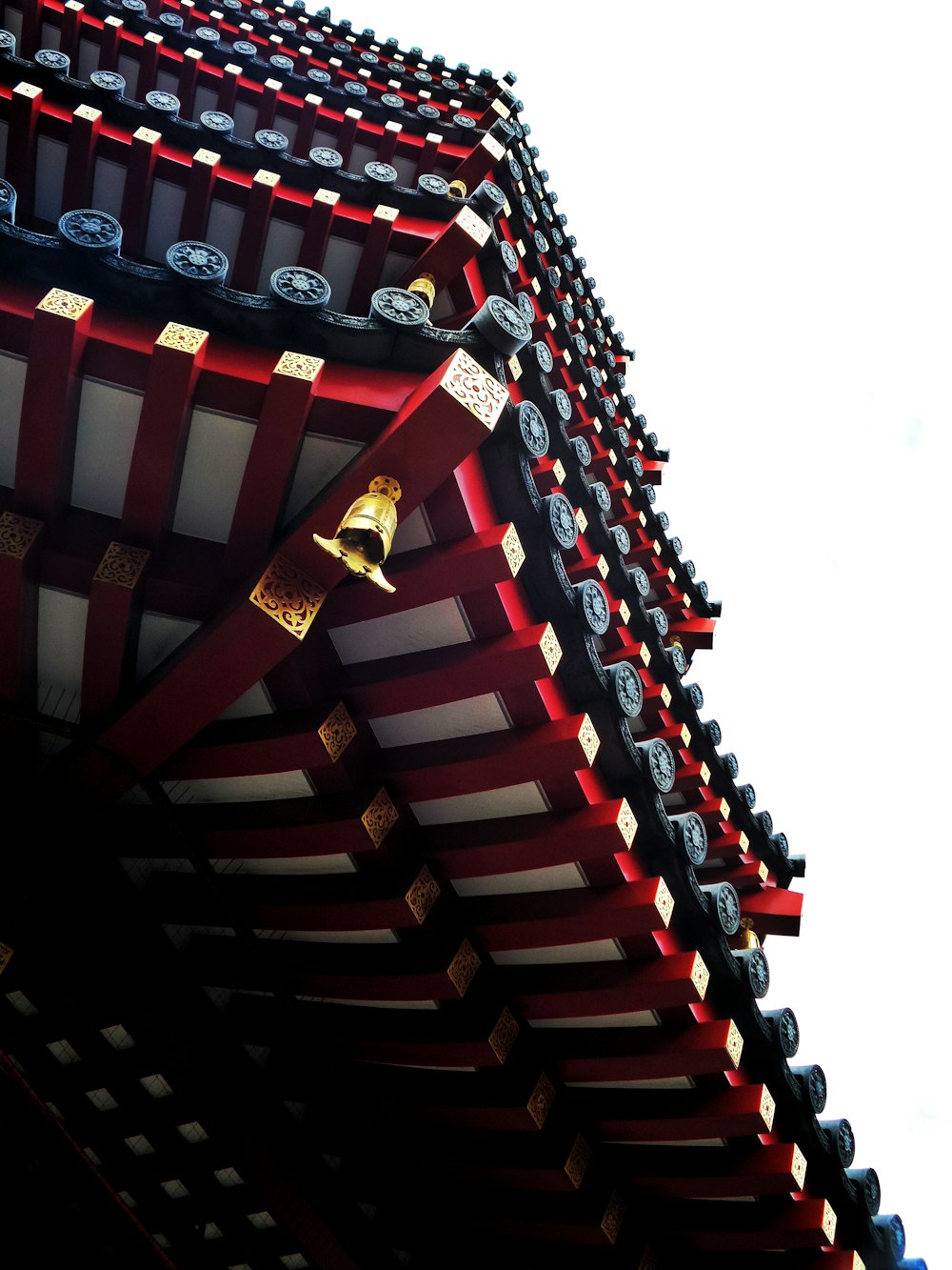 red and gold cross on top of building