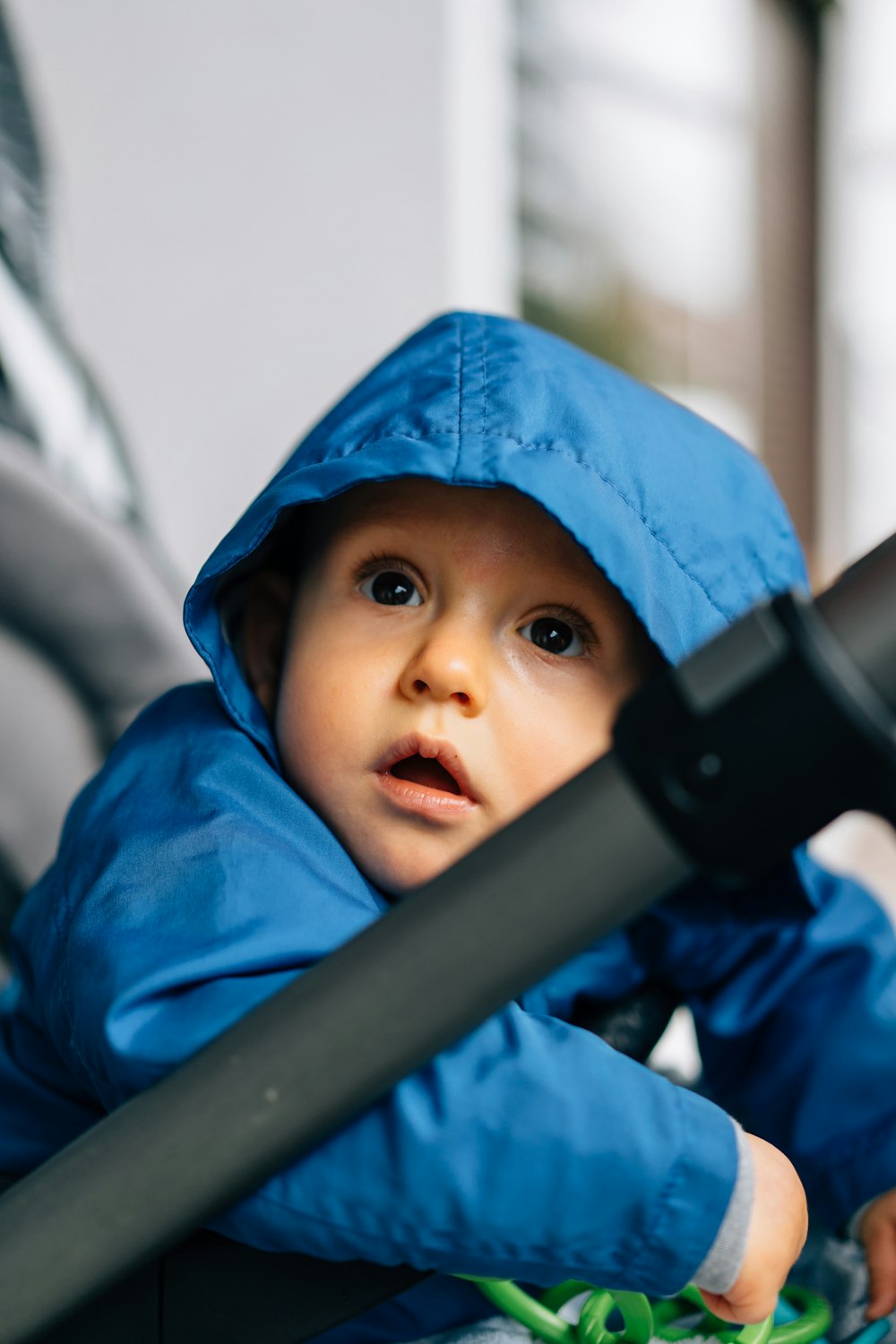 boy in blue hoodie jacket