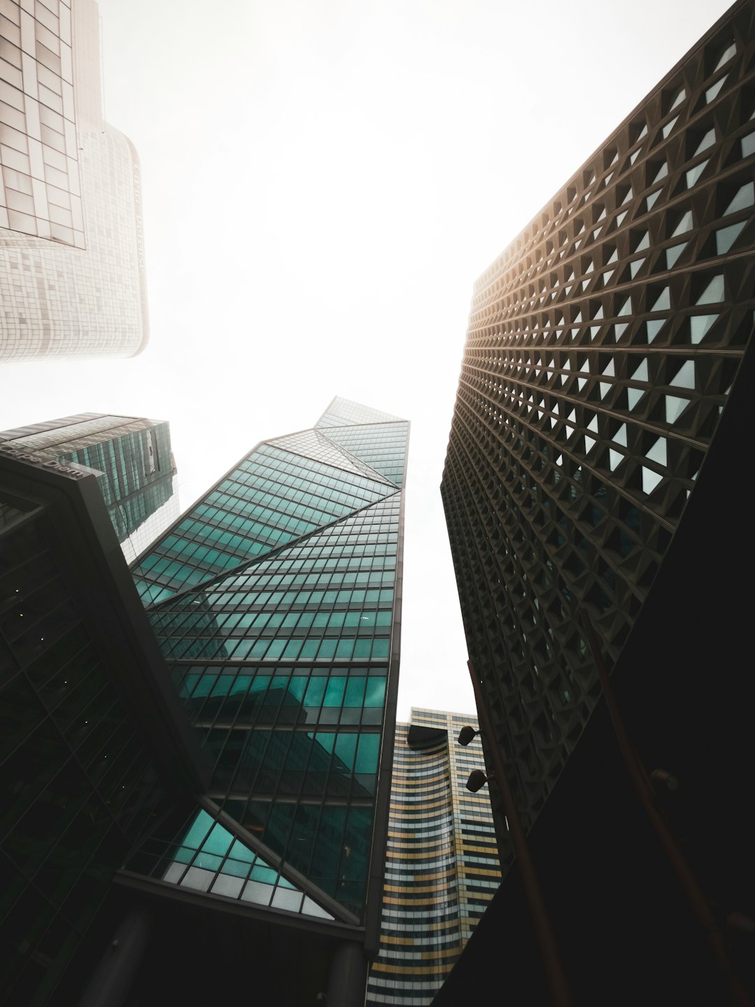 low angle photography of high rise buildings