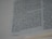 A close-up image of a page from a book, showing text in a serif font with uniform spacing and alignment. The text appears to be in English and covers multiple lines on both pages.