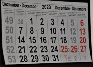 black and white calendar on white wall