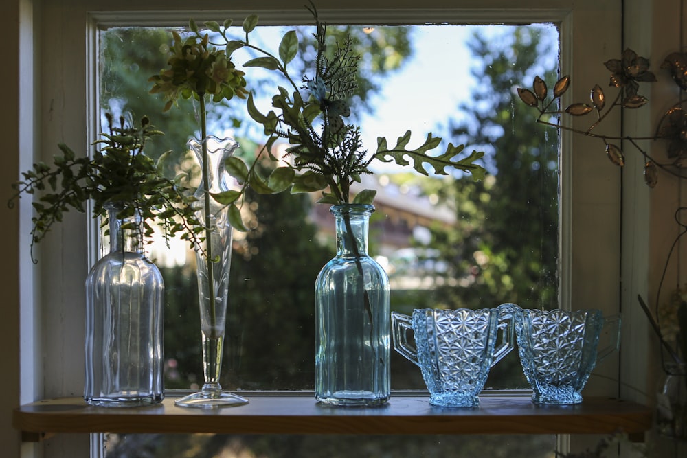 blue and white floral ceramic vase on brown wooden table