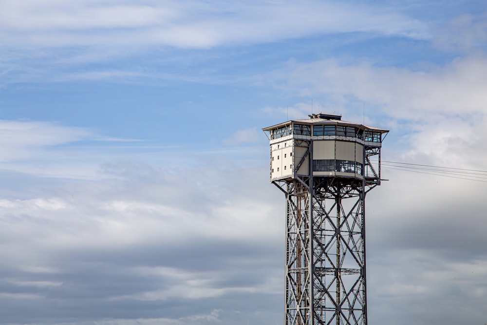 white and black tower under blue sky during daytime