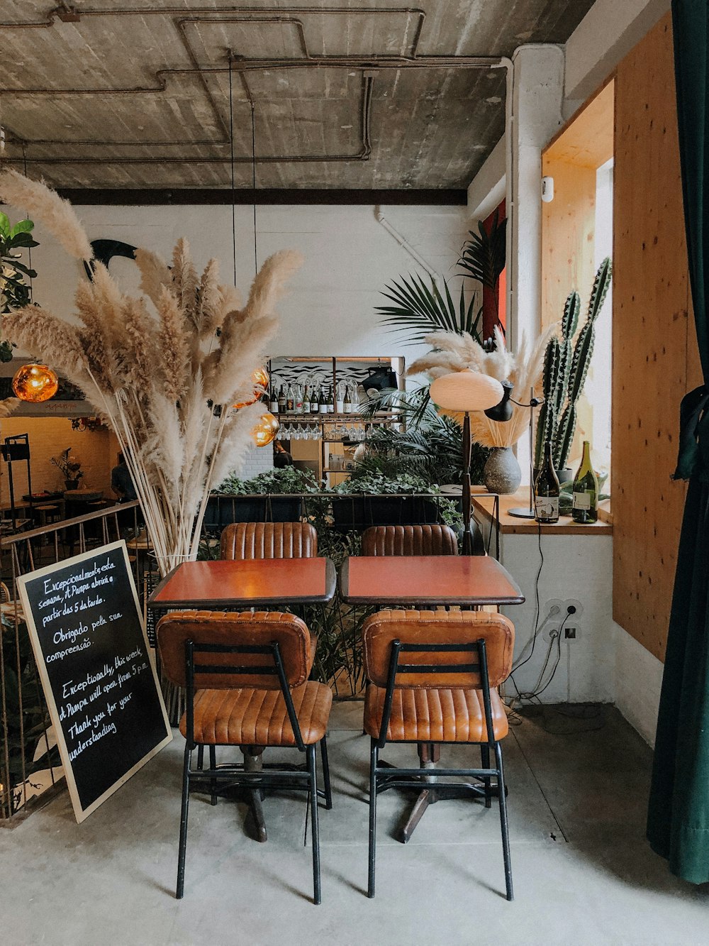 brown wooden chairs and tables