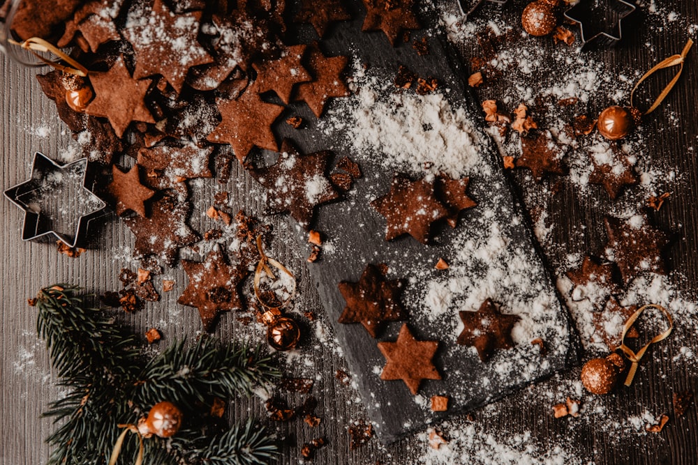 a table topped with cookies and christmas decorations