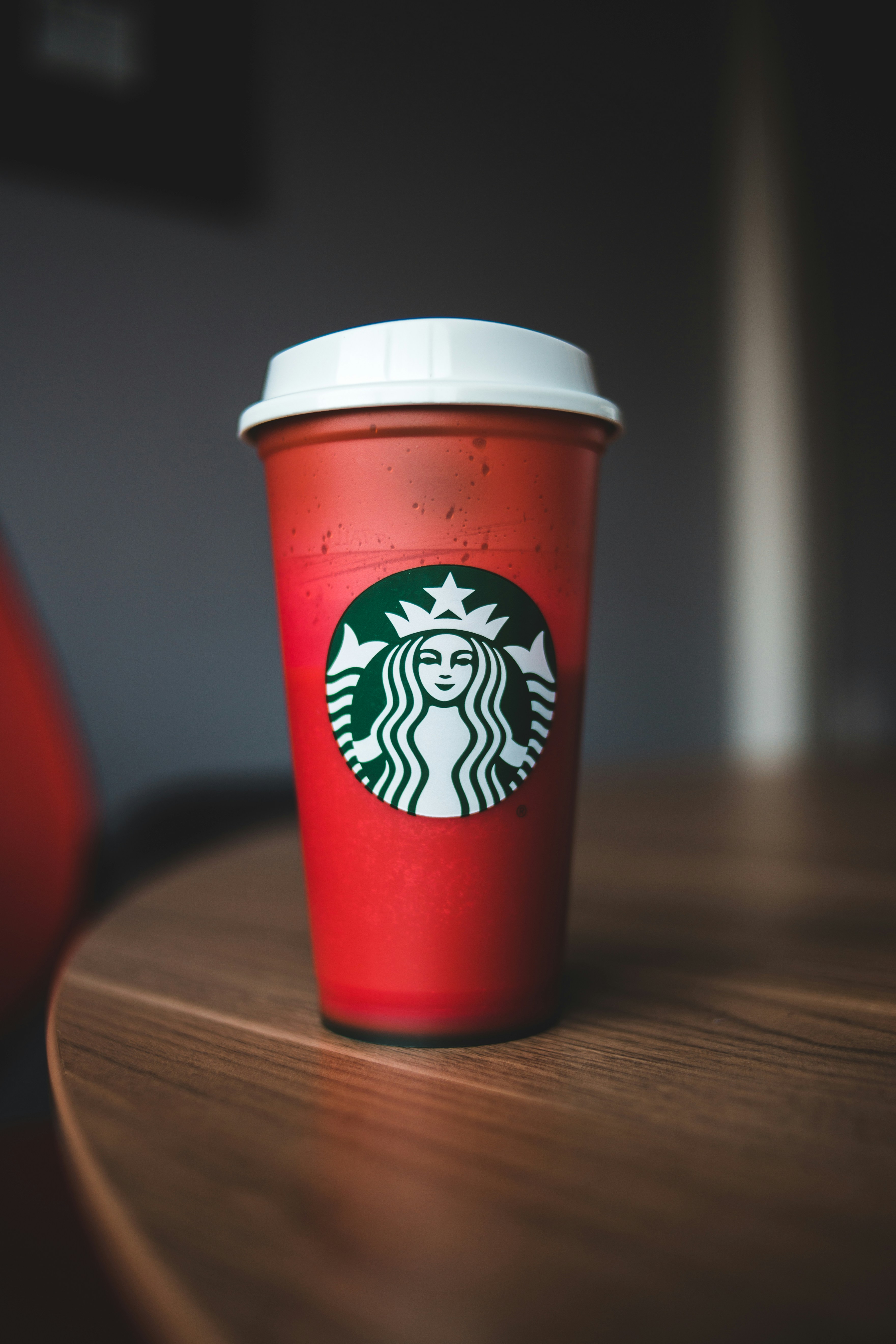 Red and white starbucks disposable cup photo  Free Logo Image on Unsplash