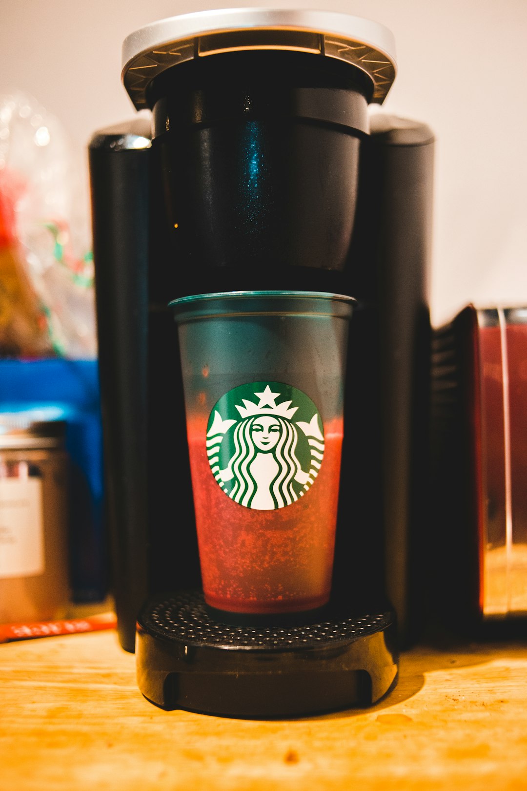 black and brown starbucks coffee cup
