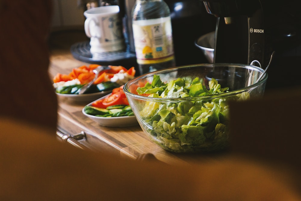 green vegetable in clear glass bowl