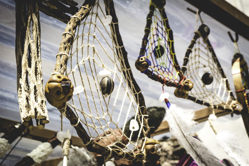 brown wooden hanging decor on blue and white boat