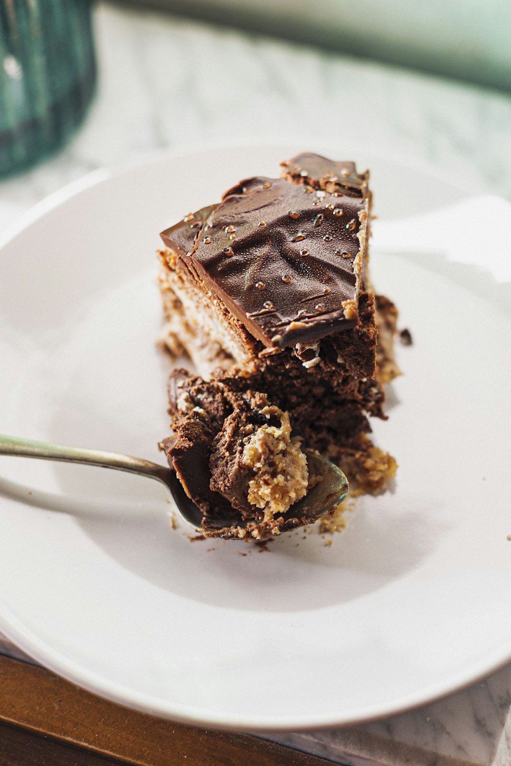 chocolate cake on white ceramic plate