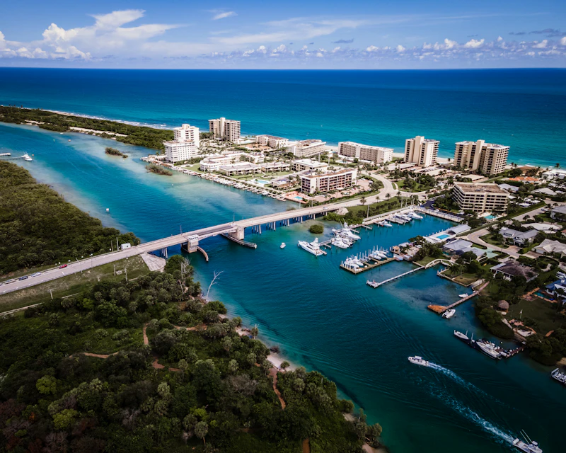 Aerial view of luxury waterfront condominiums and marina