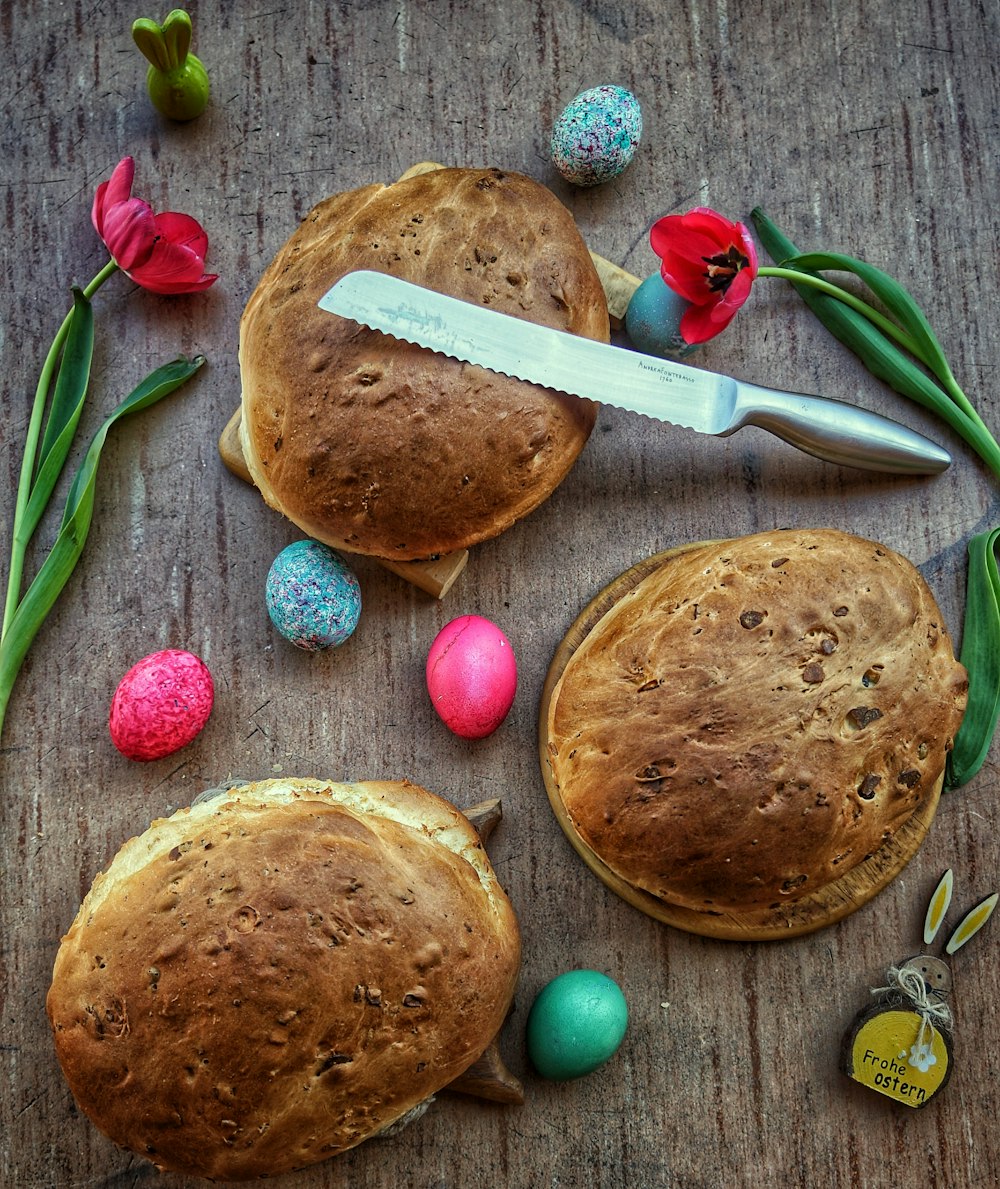 brown bread beside red handled knife