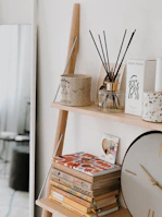brown wooden table decor on white wooden shelf