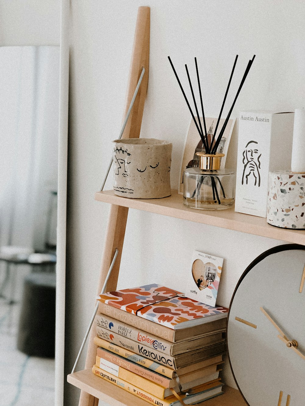 brown wooden table decor on white wooden shelf