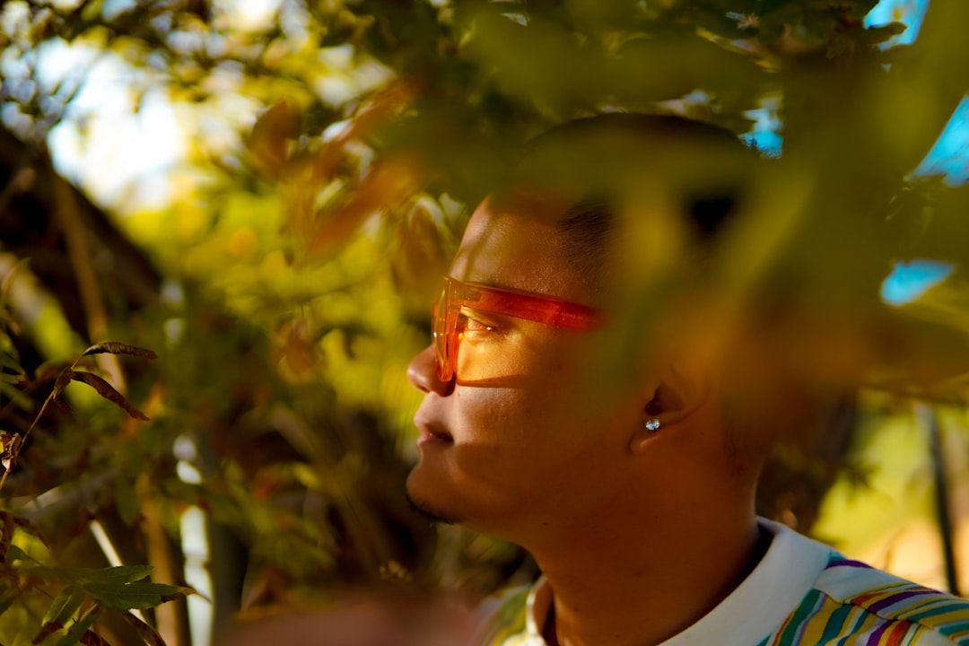 woman in white shirt wearing eyeglasses