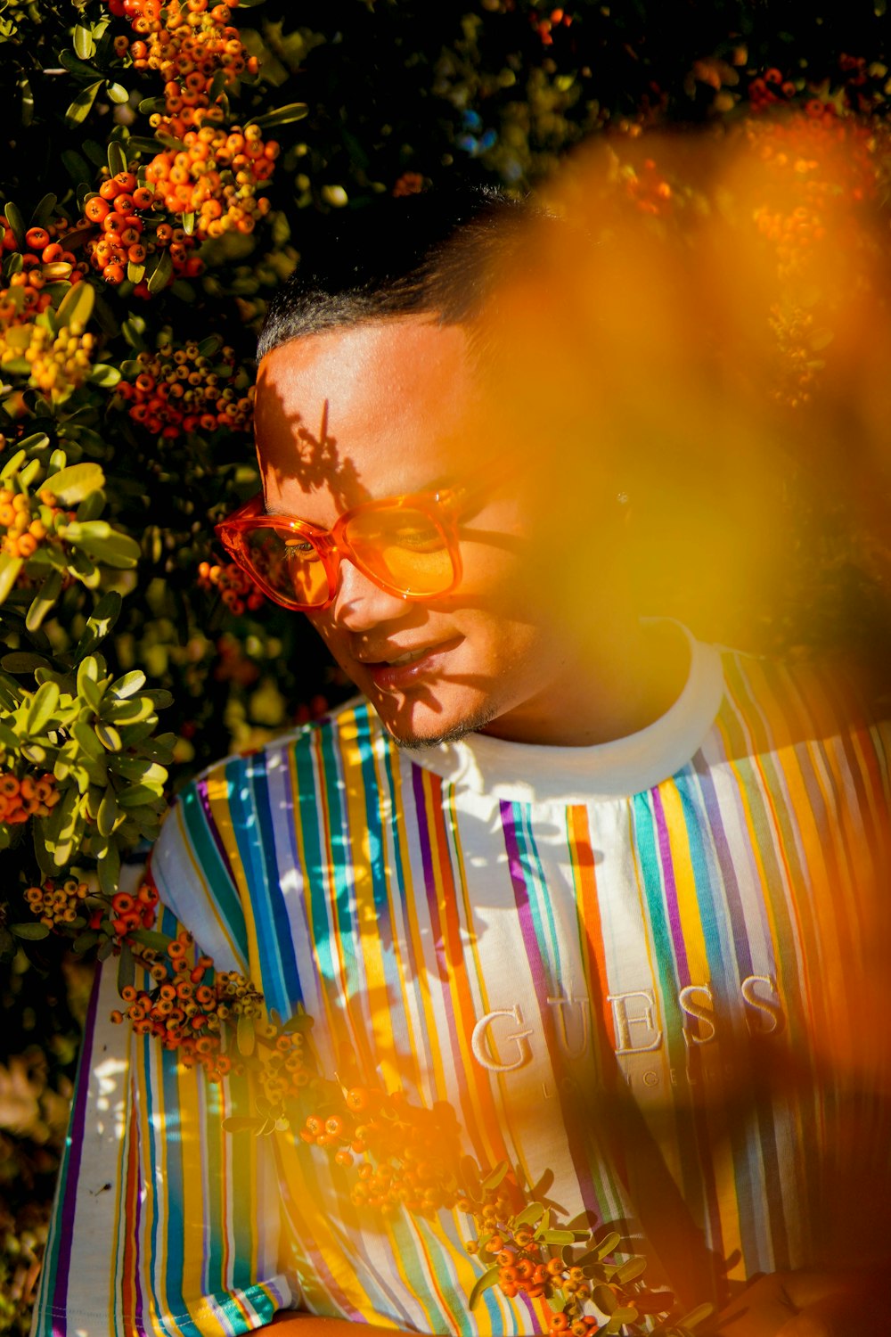 man in white crew neck shirt wearing sunglasses