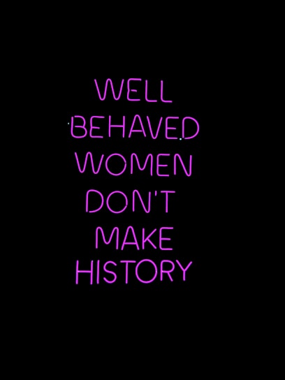 Neon pink text on a black background conveying a powerful message about the impact of behavior on making history.