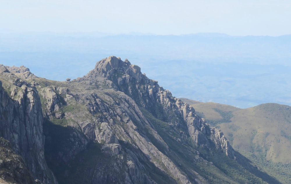 green and gray mountain under blue sky during daytime