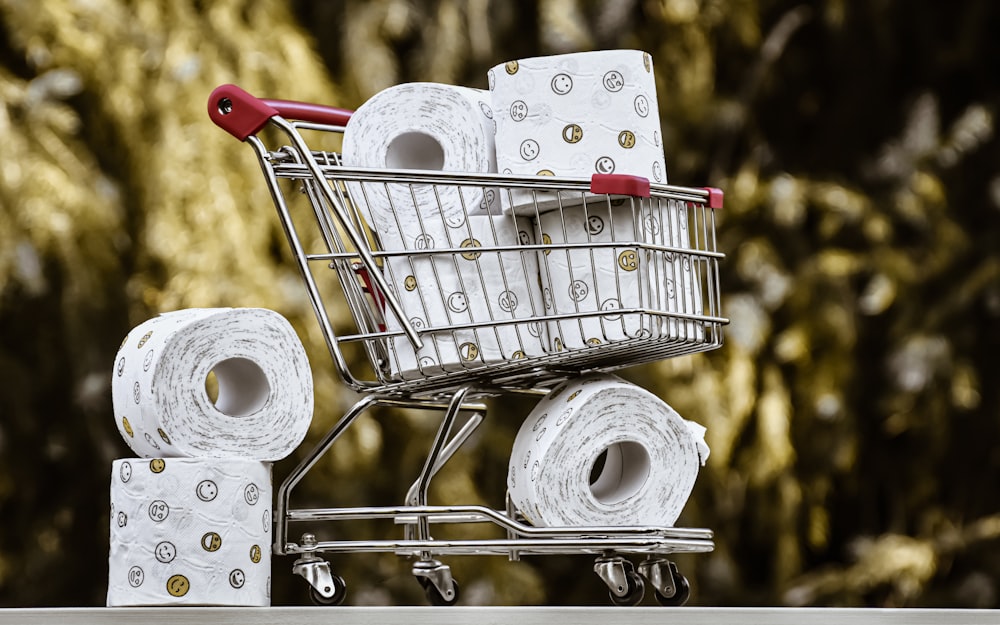 white tissue paper roll on stainless steel shopping cart